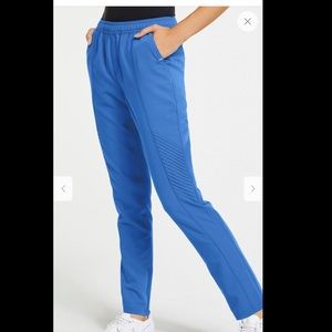 Brand new Jaanuu women’s size L scrubs. 4 items for this price